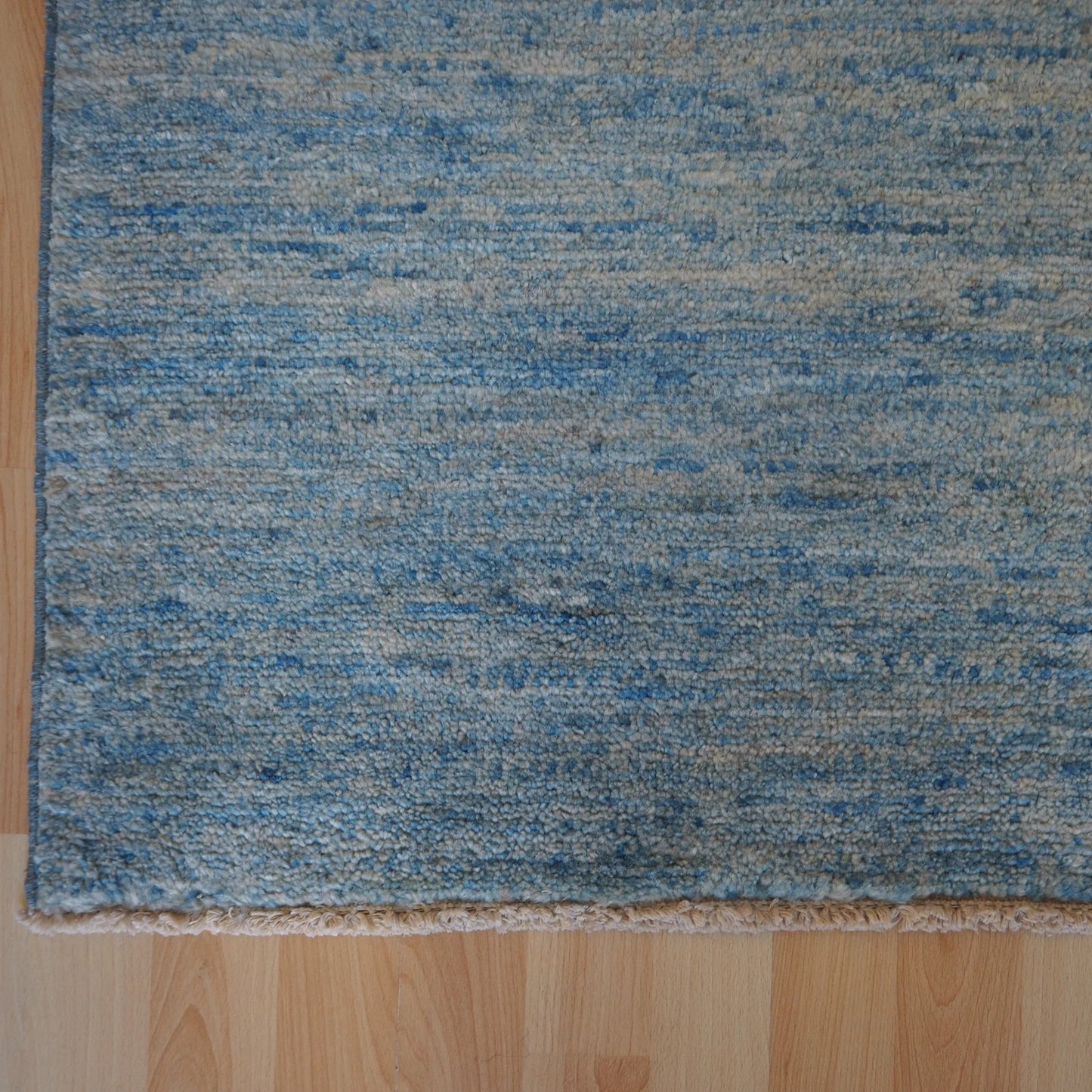 Plain blue natural colour Rug