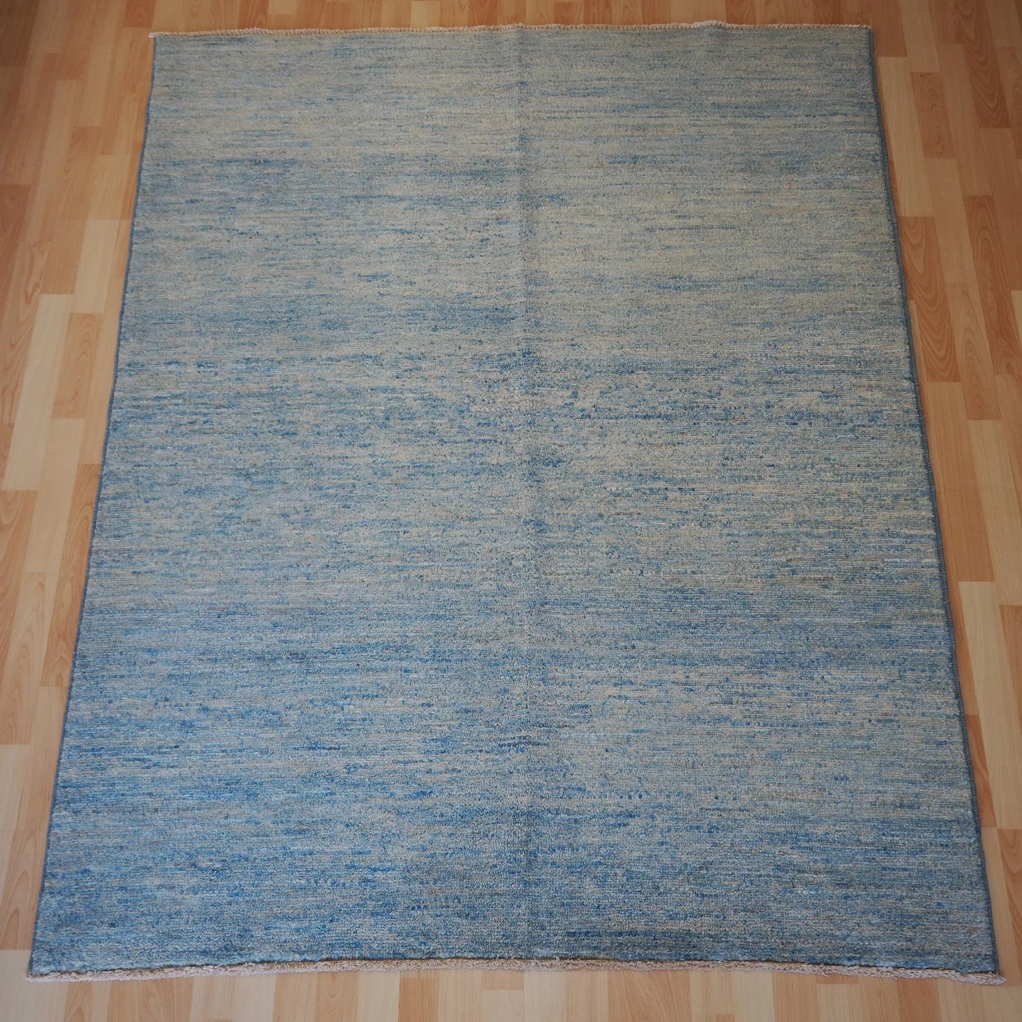 Plain blue natural colour Rug