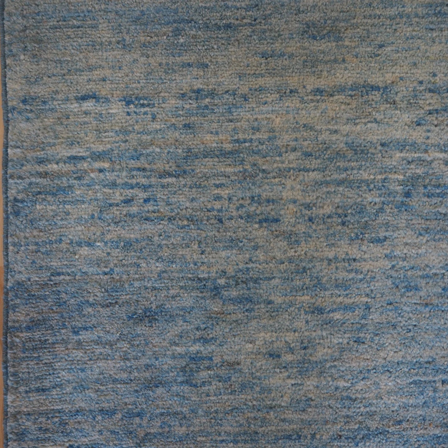 Plain blue natural colour Rug