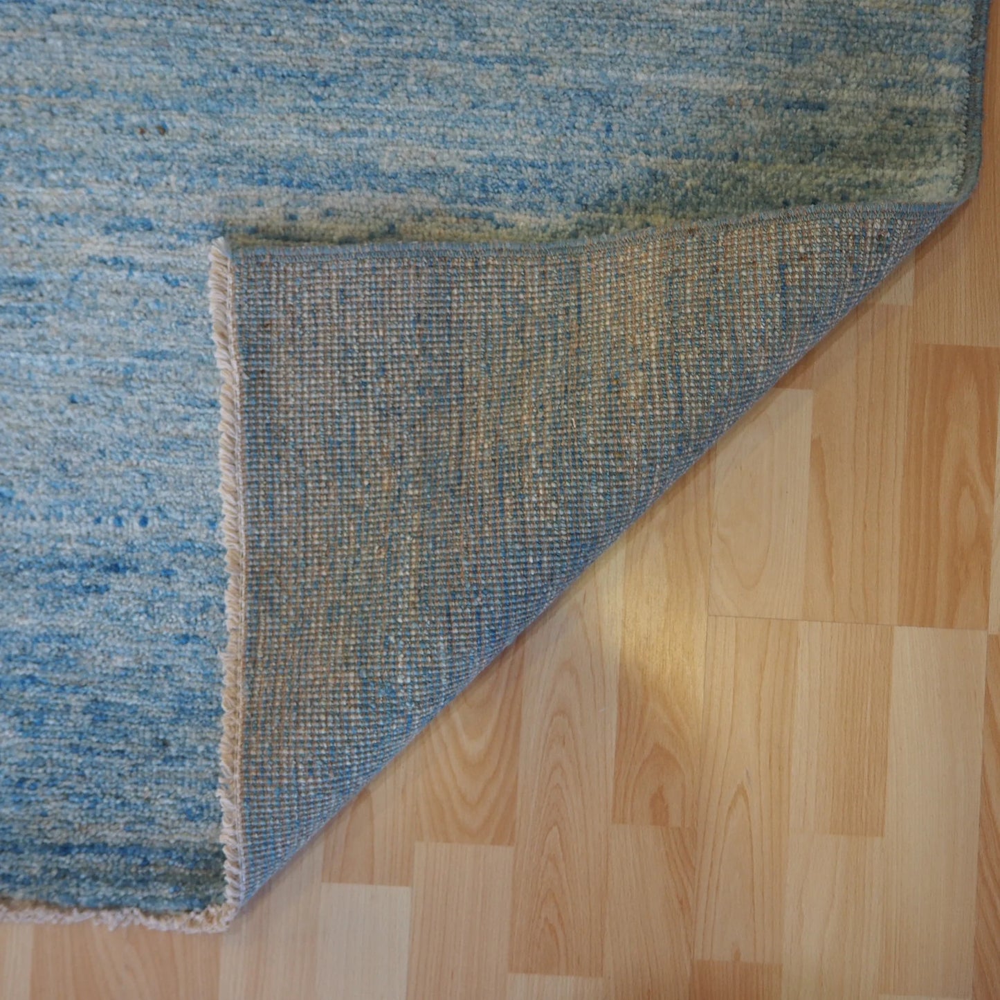 Plain blue natural colour Rug